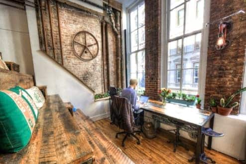 a amn working at a coworking space in new york city