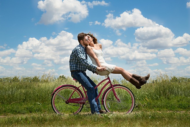 two couples enjoying a bike ride in the countryside
