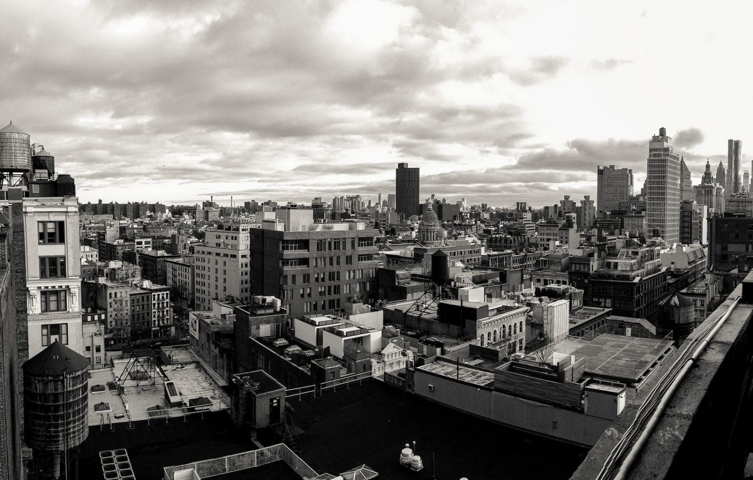 a view of new york skyline in black and white