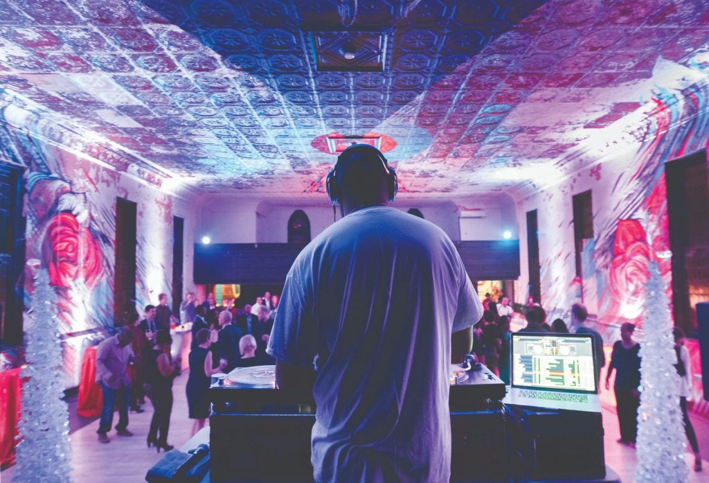 dj playing music in an event venue in Washington