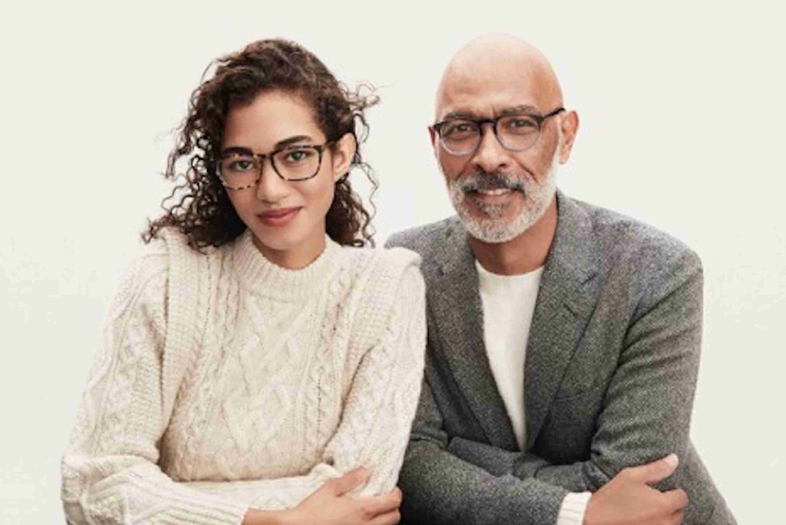 man and woman looking at camera