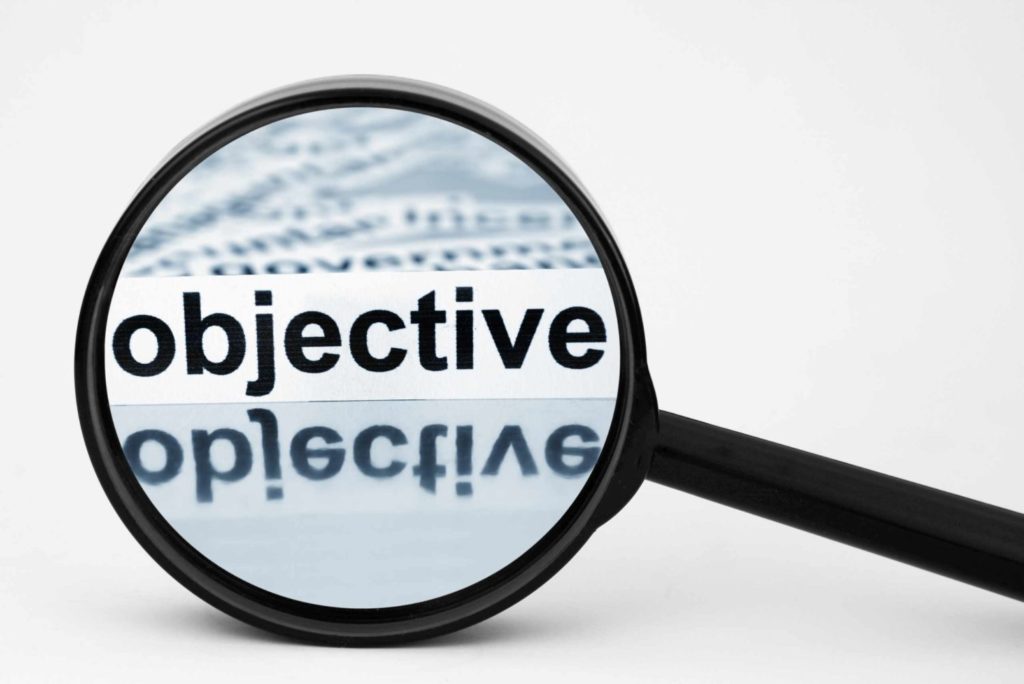 objective in a magnifying glass